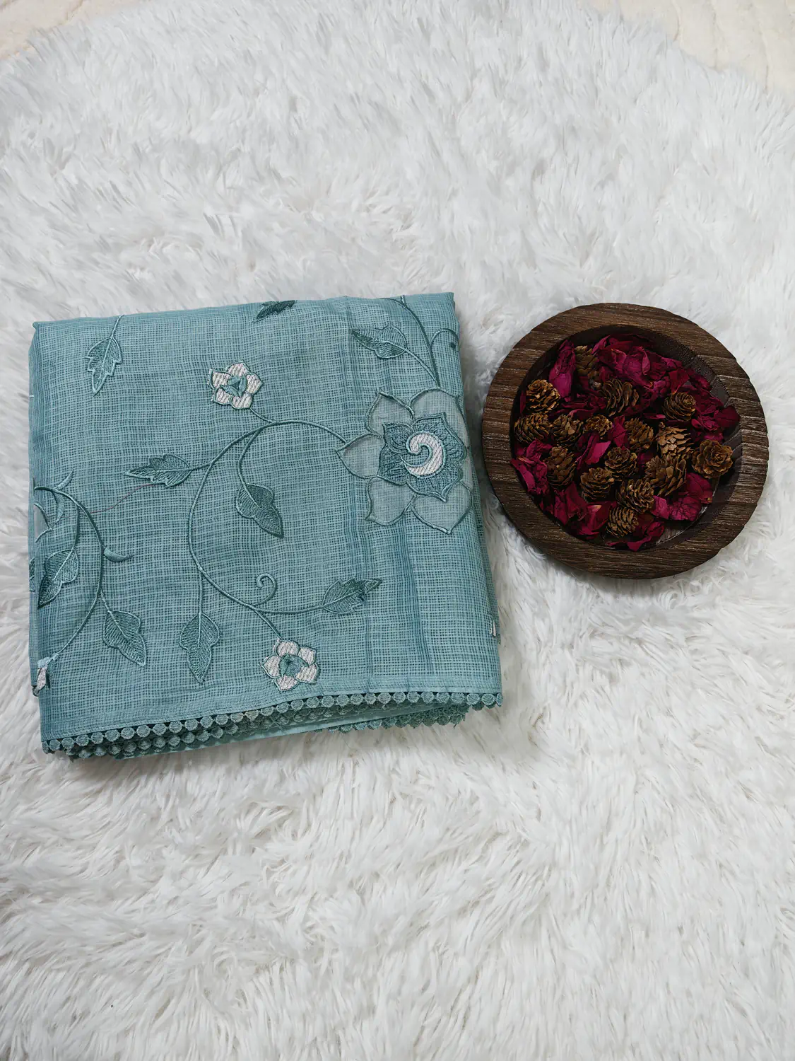 Aqua green Kota Doria saree with dark vine appliqué and small white flowers