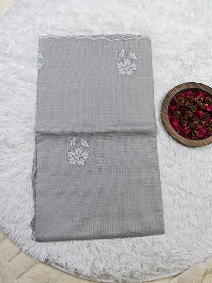 Cotta Applique Grey (4)_lr Folded Grey Kota Applique Saree showing spaced white floral motifs