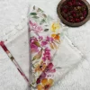 Printed Linen Saree (3)_lr Corner detail of Printed Linen Saree with yellow, pink and green botanical print