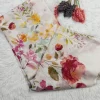 Printed Linen Saree (5)_lr Folded sections of Printed Linen Saree showing its soft watercolour-style floral pattern