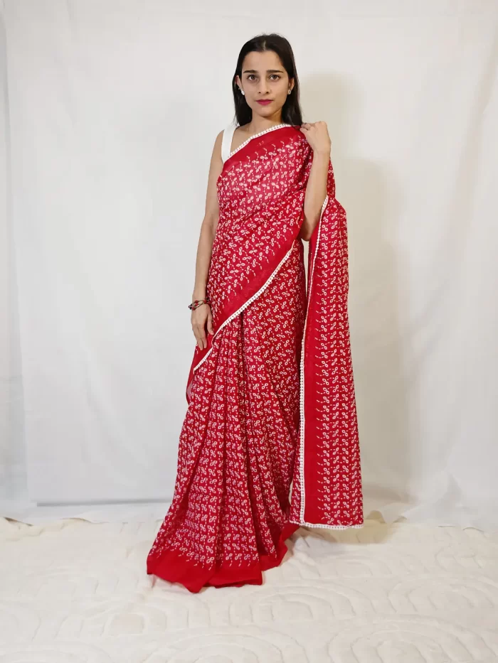 Saree - Hakoba Red (2)_lr Front upper-body view of model wearing Red Hakoba Kota Embroidery Saree with dense white motifs