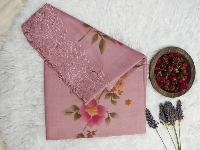 Silk cut work with floral print (2)_lr Close-up of Silk Cutwork Saree showing pink floral print and tonal cutwork edge