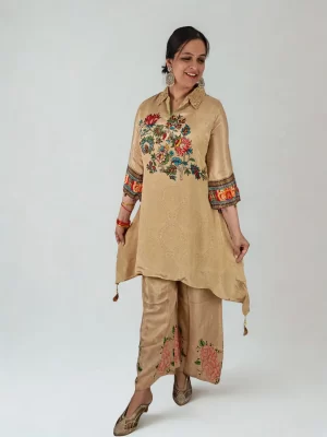 Front view of Floral Filigree muslin set with high-low top