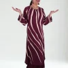 Leheriya Tie-Dye Print Side pose showing the flowing plum Leheriya striped set