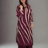 The Plum Leheriya set in a relaxed front pose