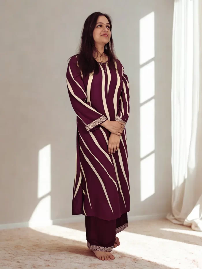 Casual Plum Co-ord The Plum Leheriya set styled beside a sunlit window