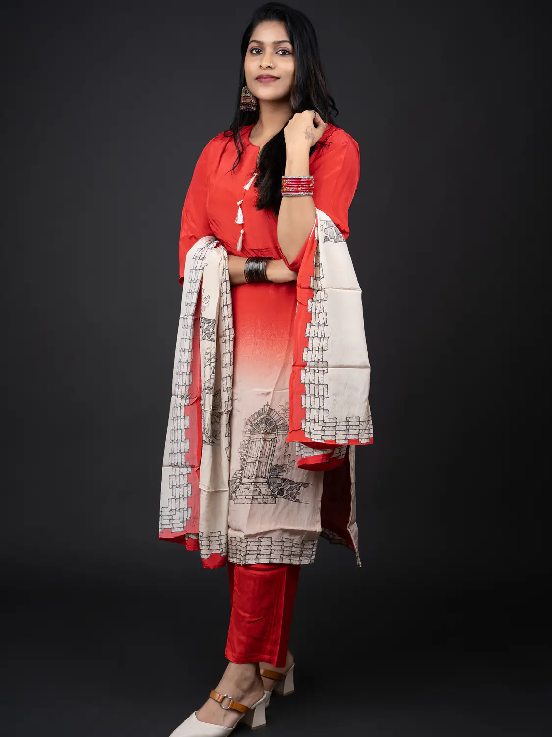 Dark Peach Cottage suit with printed dupatta in an angled pose