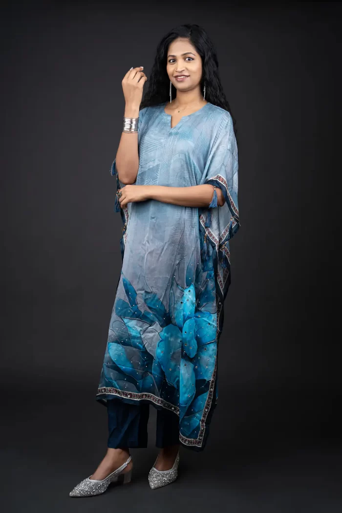 Ice Blue-Teal Floral 2 Piece Kaftan Set (1) Angled full-length view of the Ice Blue-Teal floral kaftan