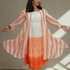 Sorbet shrug dress with striped overlay spread to show its shape