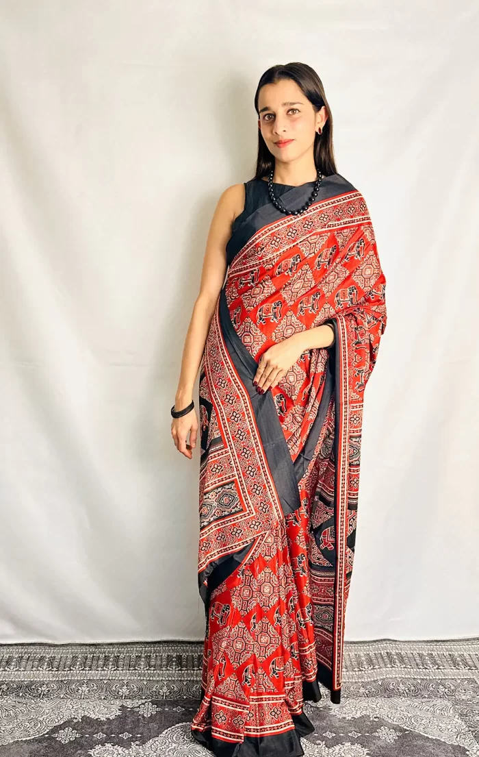 IMG_0548 Traditional red printed saree with ethnic elephant motifs