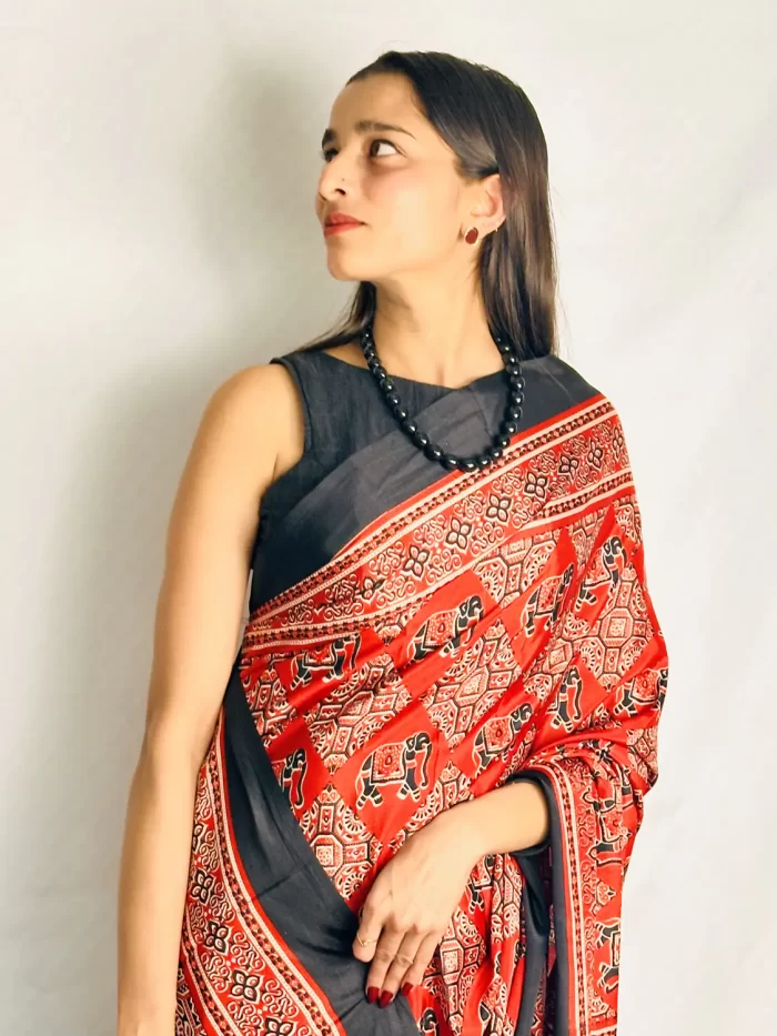 IMG_0550 Red elephant print satin silk saree with black border