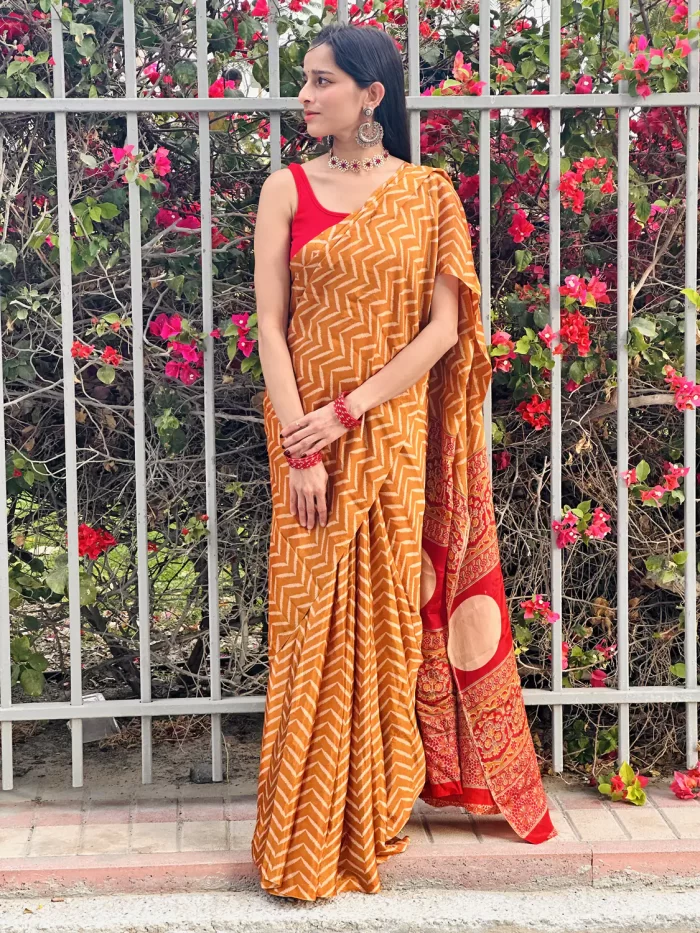 IMG_0607 Front view of Sunset Mustard zigzag saree by flowering vines
