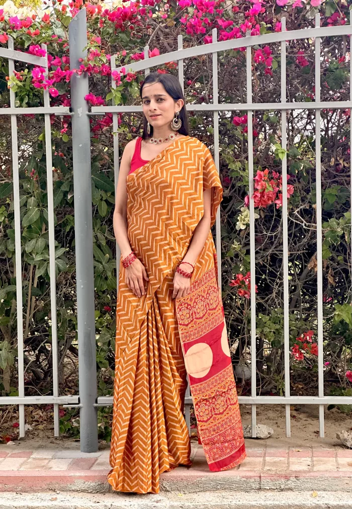 IMG_0608 Mustard printed saree with decorative red border