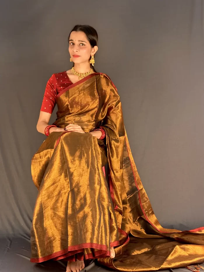 Golden saree with red border