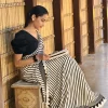 Black and white saree seated pose styling