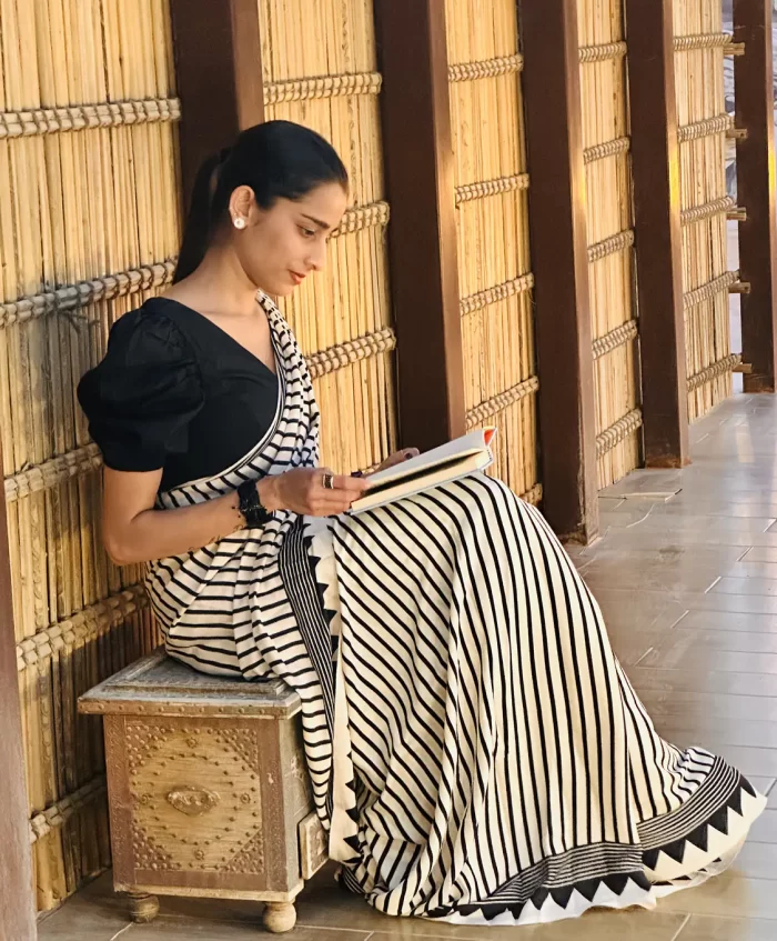 Black and white saree seated pose styling