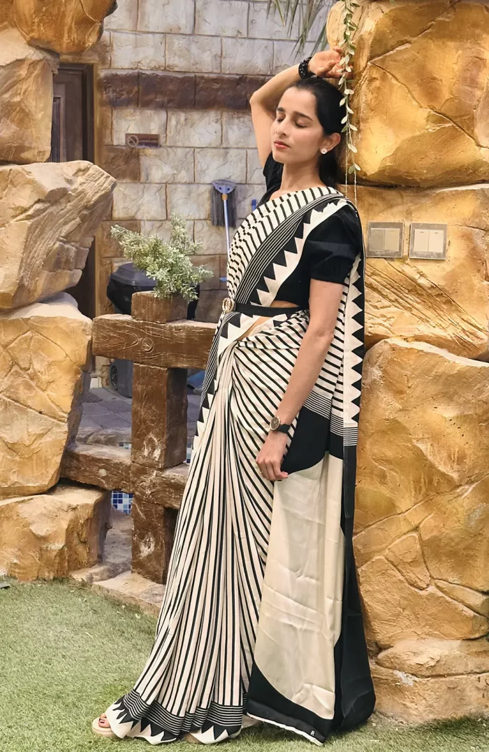 Modern black and white saree with geometric border detail