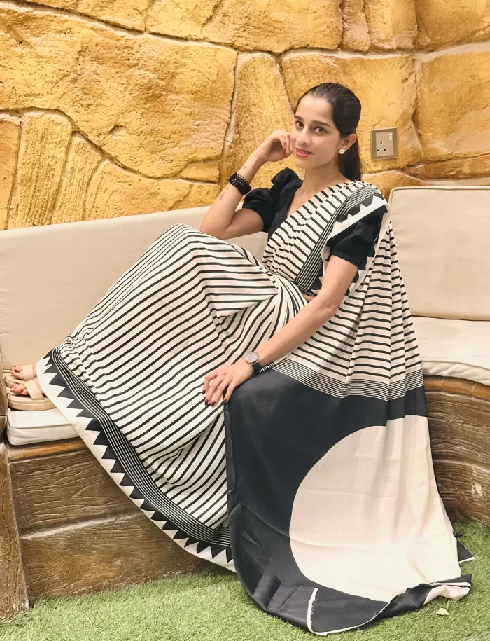 Stylish black and white saree for festive occasions