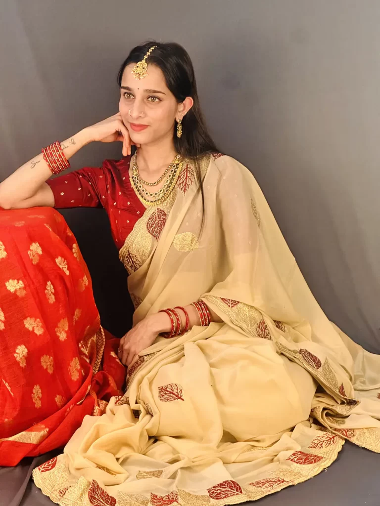 Beige chiffon saree with crimson leaf embroidery festive wear