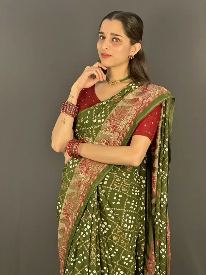 Forest Green Bandhini Viscose Georgette Saree (5) Bandhini style green saree with matching blouse piece included