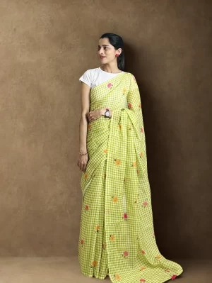 Lime Blossom gingham saree with floral motifs shown in a three-quarter standing view