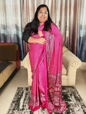 Full-length front view of Rani pink Ajrakh satin silk saree with chevron print