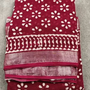 Maroon ethnic saree with handcrafted-inspired patterns