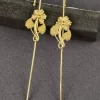 BLOOMING STEM EAR CUFF Blooming Stem Ear Cuffs with sculpted flowers, leaf details and extended stems