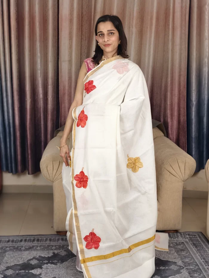 Chembarathi Hand Painted Saree (2) Chembarathi Hand-Painted Saree front pose highlighting red hibiscus florals