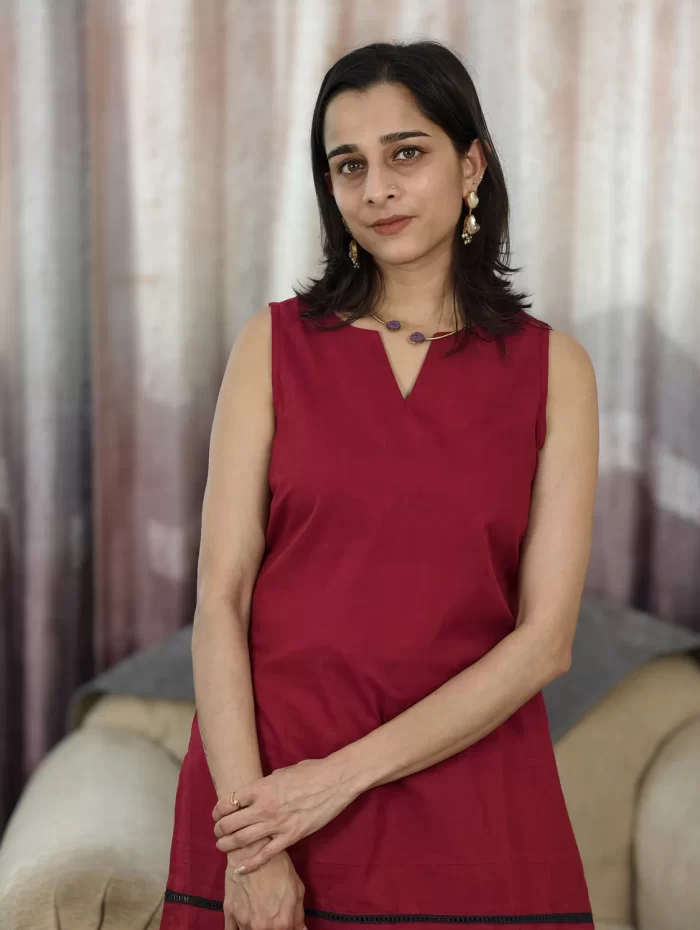 Deep Red Farshi Salwar Set (13) Deep Red Farshi Salwar Set close-up highlighting the V-neck tunic
