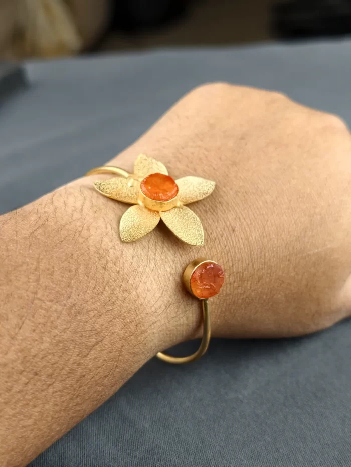GOLDEN DAHLIA OPEN BANGLE - SAFFRON (2) Saffron Golden Dahlia Open Bangle worn on the wrist