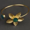 GOLDEN DAHLIA OPEN BANGLE - TURQUOISE Turquoise Golden Dahlia Open Bangle with a textured flower and round stone tips