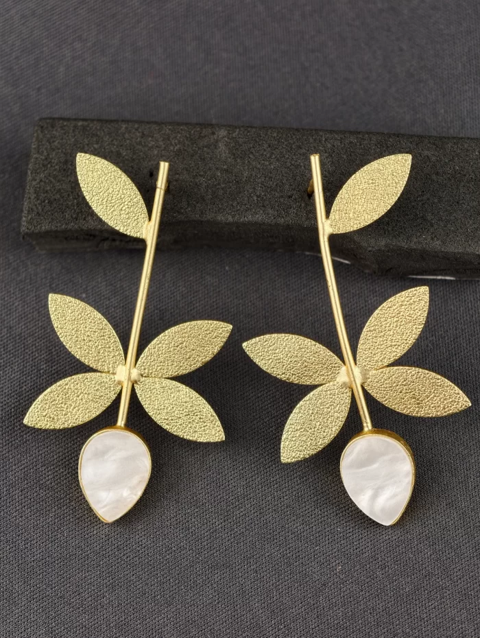GOLDEN LEAF STEM EARING Golden Leaf Stem Earrings with textured leaves and softly irregular pearl-like drops
