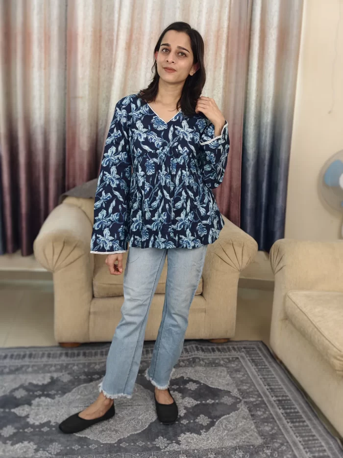 Indigo Floral Print Peplum Top (3) Indigo Floral Print Peplum Top front view with flared sleeves