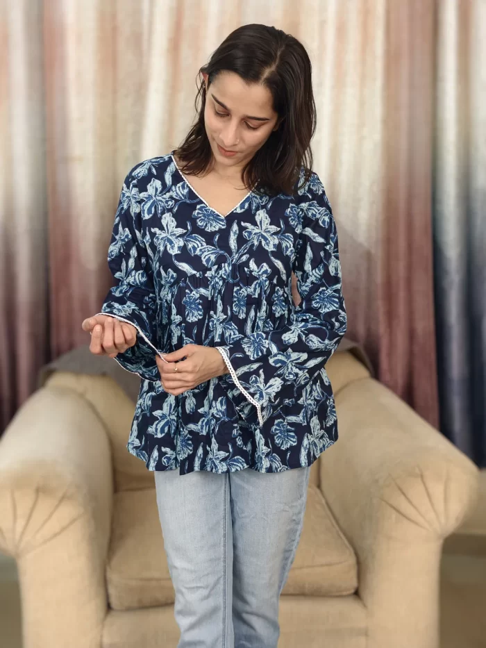 Indigo Floral Print Peplum Top (9) Indigo Floral Print Peplum Top close-up of the cuff lace and floral print