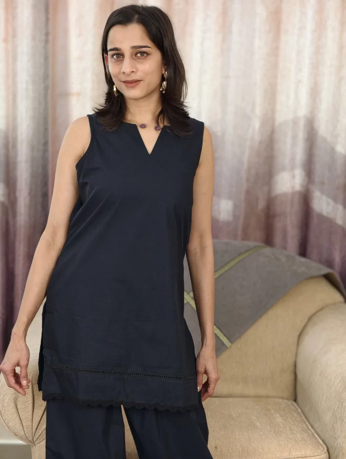 Midnight Black Farshi Salwar Set close-up showing the V-neck and lace-trim hem