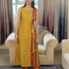 Mustard Yellow Zari Bordered Co-Ord Set close-up showing the red zari trim