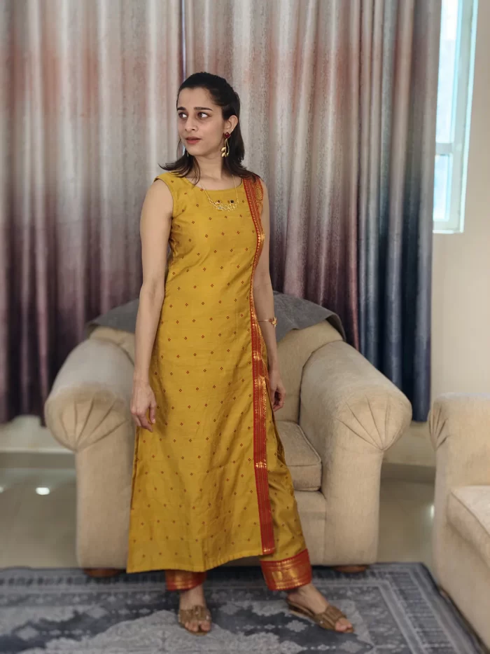 Mustard Yellow Zari Bordered Cotton Silk Coordset (5) Mustard Yellow Zari Bordered Co-Ord Set in a relaxed three-quarter pose