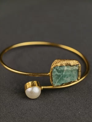 Oceanic Pearl and Stone Open Bangle with a pale raw-look rectangular stone and pearl accent