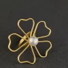 Open Petal Pearl Ring with a wire flower and pearl-like centre