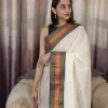 Offwhite Mulcotton Saree with Black & Orange Border (10) Three-quarter view of Off-White Mul Cotton Saree with black-orange border draped over the shoulder