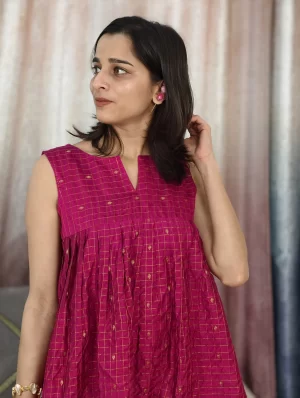 Rani Pink Zari Checked Dress close-up highlighting the neckline and gold checks