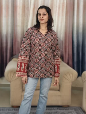 Front view of the rust Ajrakh short kurti featuring an all-over traditional print and relaxed fit