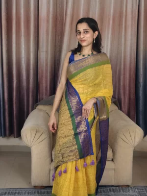 Yellow Mul Cotton Saree with Green & Blue Border (1) Yellow Mul Cotton Saree with Green & Blue Border in a front portrait