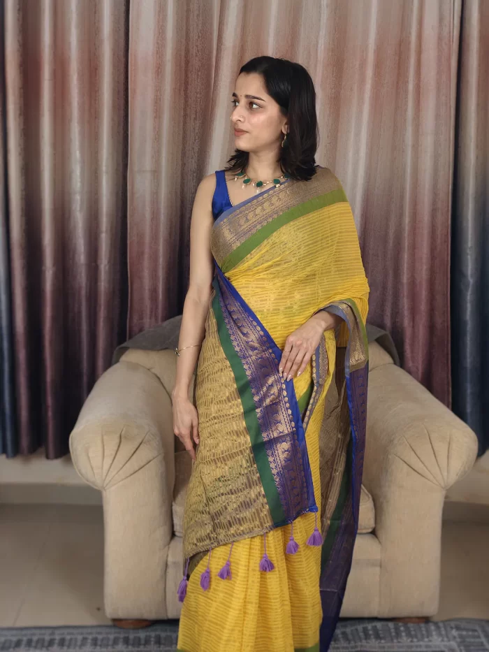 Yellow Mul Cotton Saree with Green & Blue Border (6) Yellow Mul Cotton Saree with Green & Blue Border three-quarter portrait