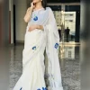Shangupushpam Hand-Painted Saree – Full View Shangupushpam hand-painted ivory saree with blue floral motifs and silver border – full-length front view