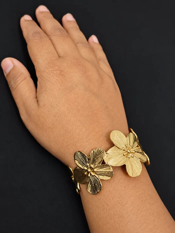 dual-bloom-sculpted-floral-cuff-worn-1.webp Dual Bloom Sculpted Floral Cuff