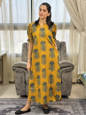 Mustard and teal printed cotton maxi dress with puff sleeves and side pockets
