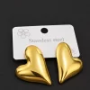 puffed-heart-statement-earrings-1.webp Gold-tone puffed heart statement earrings