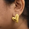 puffed-heart-statement-earrings-worn-1.webp Puffed Heart Statement Earrings